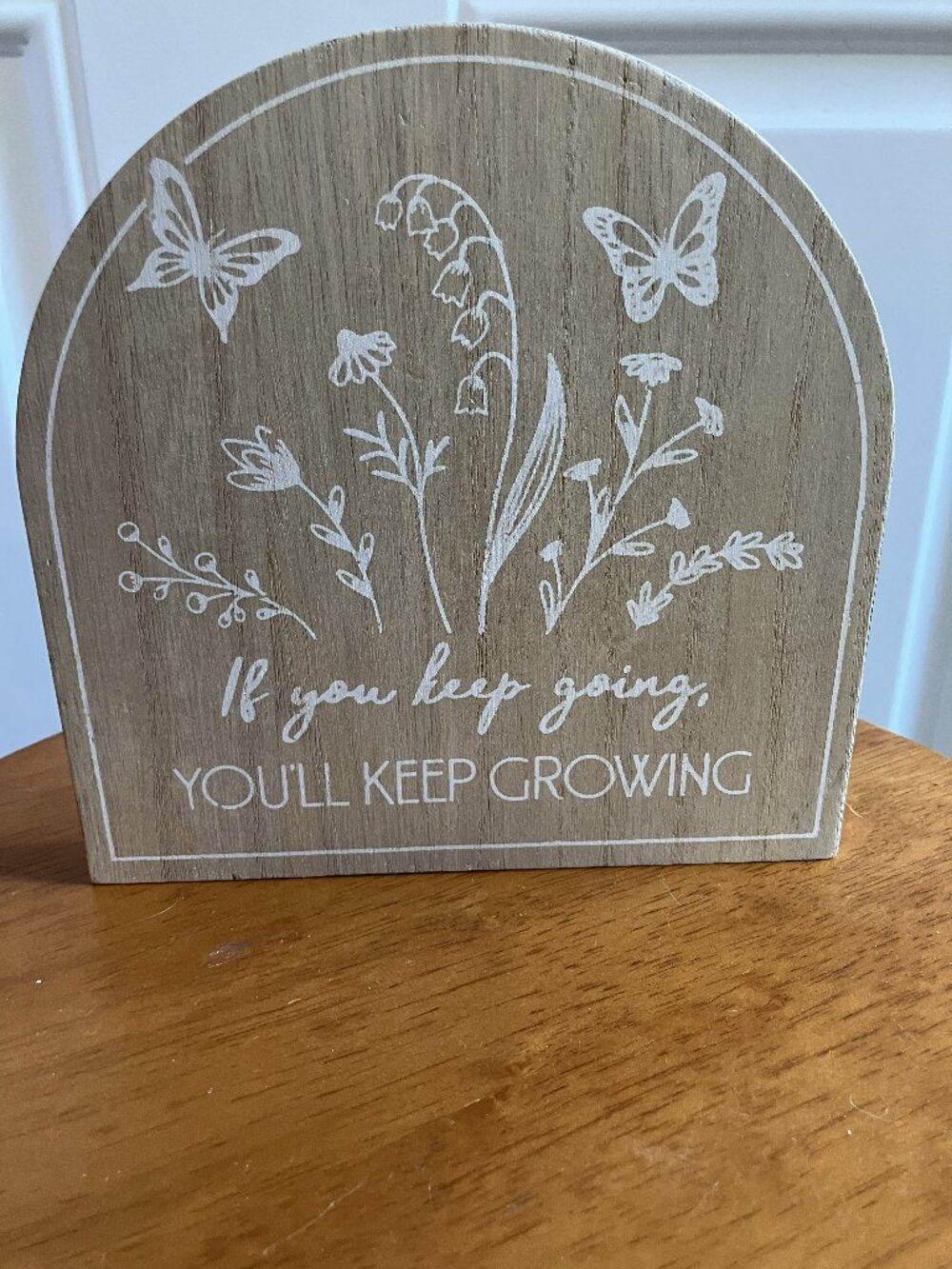 If you keep going, you'll keep growing Sign by True Living